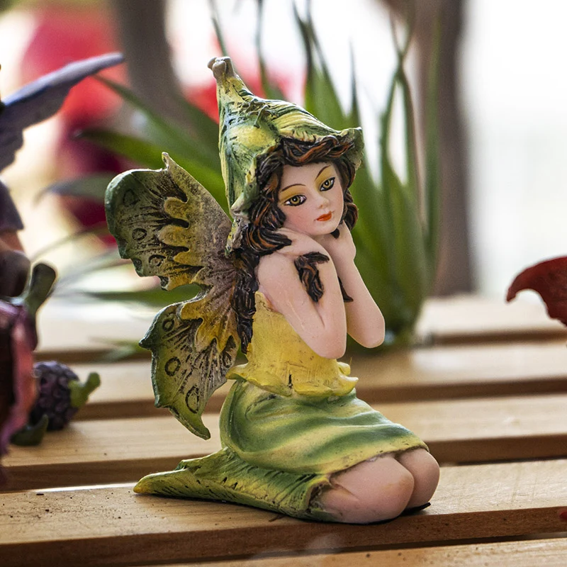 Small Sitting Yellow Fairy Figurine - Image 4